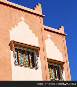 window in morocco africa and old construction wal brick historical