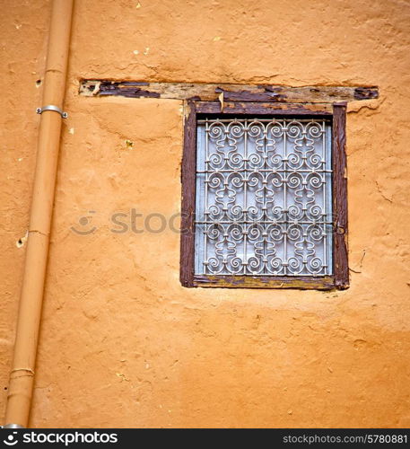 window in morocco africa and old construction wal brick historical