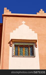 window in morocco africa and old construction wal brick historical