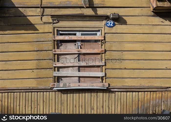 Window of an old grungy wooden house