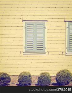 Window on the Facade of a Wooden House in Switzerland, Retro Effect