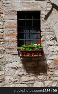 Window on the Facade of the Restored Italian Home