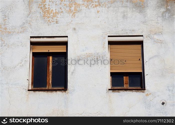 window on the white building facade in the street in Bilbao city
