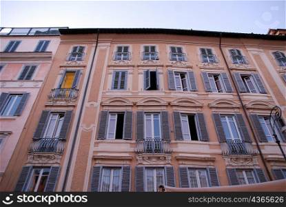 Window shutters on apartment building, Rome
