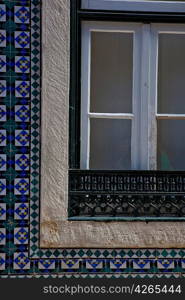 Window surrounded with mosaic tiles