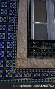 Window surrounded with mosaic tiles