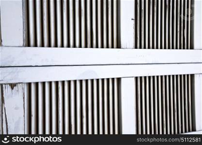 window varese palaces italy abstract sunny day wood venetian blind in the concrete brick besnate