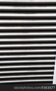 window varese palaces italy abstract sunny day wood venetian blind in the concrete brick besnate