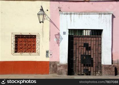 Window, wall, door and lamp in Truhillo, north Peru