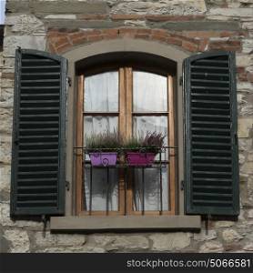Window with shutters, Radda in Chianti, Tuscany, Italy