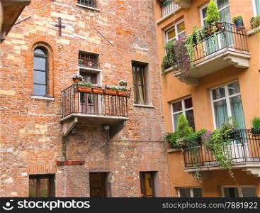 Windows and balconies in the museum courtyard Juliet. Verona, Italy