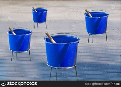 Windows cleaning water in blue plastic buckets. Background with water drops.