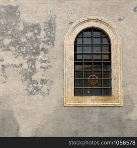 windows in the facades of ancient medieval houses