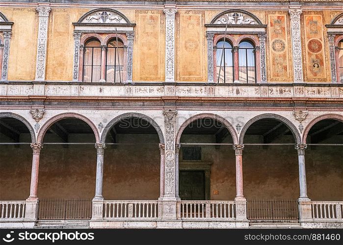windows in the facades of ancient Venetian houses