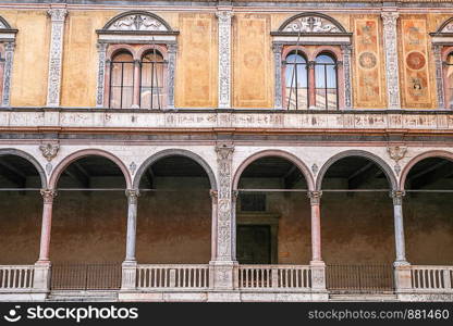 windows in the facades of ancient Venetian houses