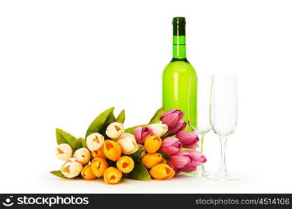 Wine and flowers isolated on the white background