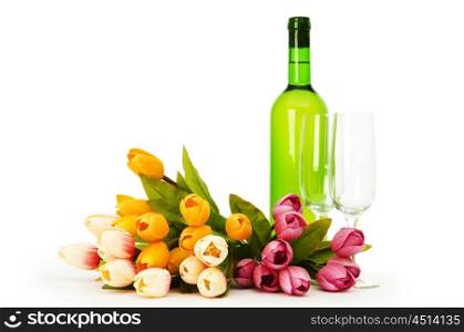 Wine and flowers isolated on the white background