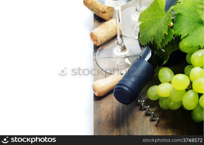 Wine and grape on wooden background