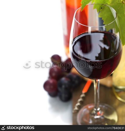 Wine and grape on wooden background