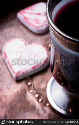 Wine and symbolic heart. Glass of wine and a symbolic heart.Valentines Day