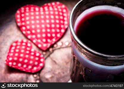 Wine and symbolic heart. Glass of wine and a symbolic heart.Valentines Day