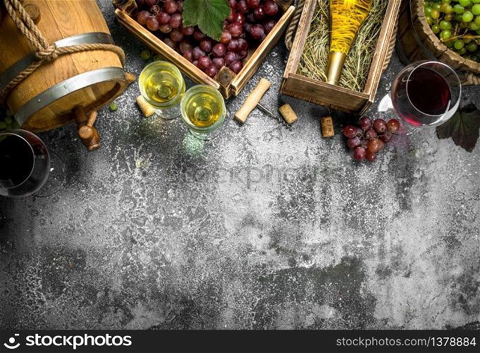 Wine background. Red and white wine from fresh grapes. On a rustic background.. Wine background. Red and white wine from fresh grapes.