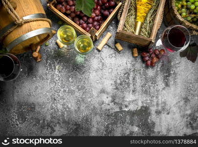 Wine background. Red and white wine from fresh grapes. On a rustic background.. Wine background. Red and white wine from fresh grapes.