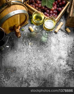 Wine background. Red and white wine from fresh grapes. On a rustic background.. Wine background. Red and white wine from fresh grapes.