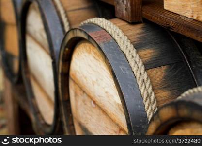 Wine barrels stacked in the old cellar