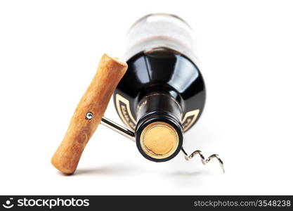 wine bottle and corkscrew isolated on white background