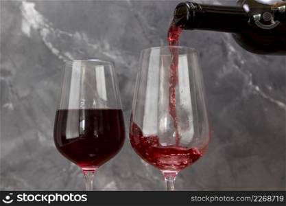 wine bottle filling wineglass