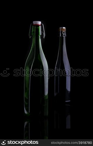 Wine bottle, still life profile, isolated on black background