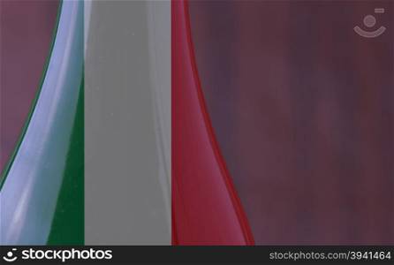 Wine bottle with Spain flag in strict close up, with copy space, horizontal image