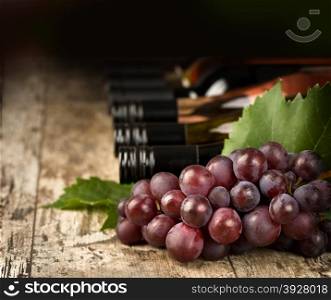 wine bottles and grape vine branch.shallow depth of focus
