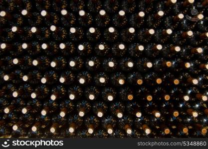 Wine bottles in a row as a pattern with cork in Mediterranean winery