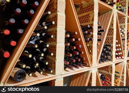 Wine Cellar from Mediterranean with bottles stacked in rows