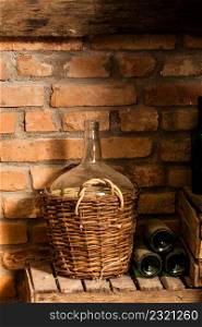 Wine cellar interior with old round flask. Wine cellar interior with old flask