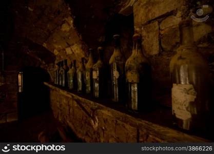 wine cellar with old wine bottles