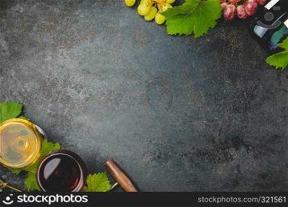 Wine composition on dark background, flat lay, copyspace. Wine composition on dark background, flat lay