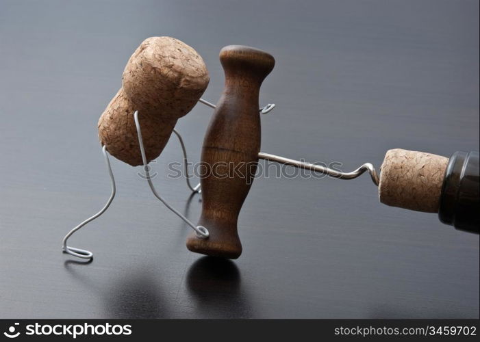 wine corks and bottle with corkscrew