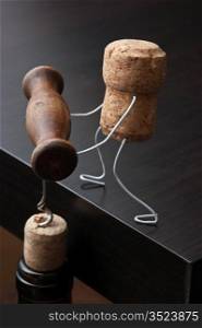 wine corks and bottle with corkscrew