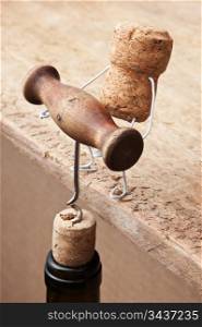 wine corks and bottle with the corkscrew