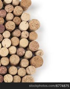 Wine corks and corkscrew isolated on white background