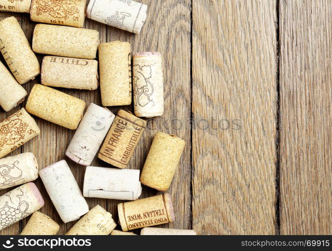 Wine corks over wooden surface with copyspace