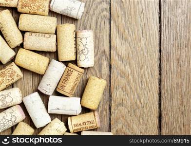 Wine corks over wooden surface with copyspace