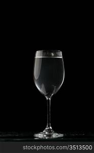 wine glass in dark place