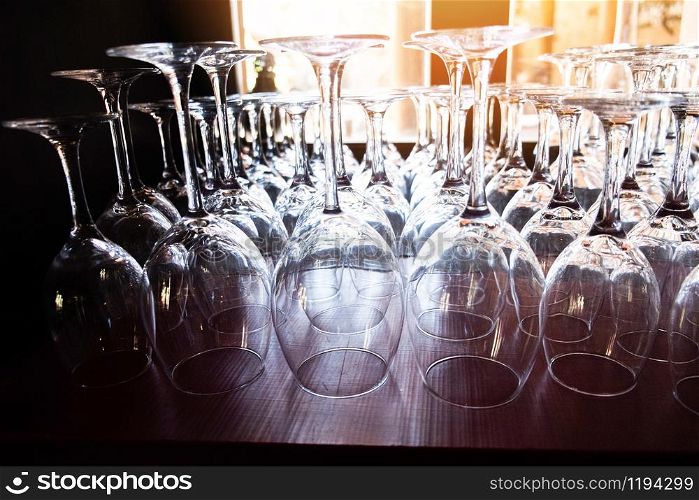 Wine glass on the table background / champagne glass for celebration party , selective focus