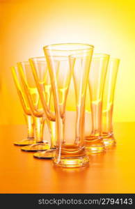 Wine glasses against gradient background