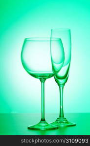 Wine glasses against gradient background