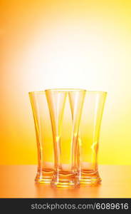 Wine glasses against gradient background